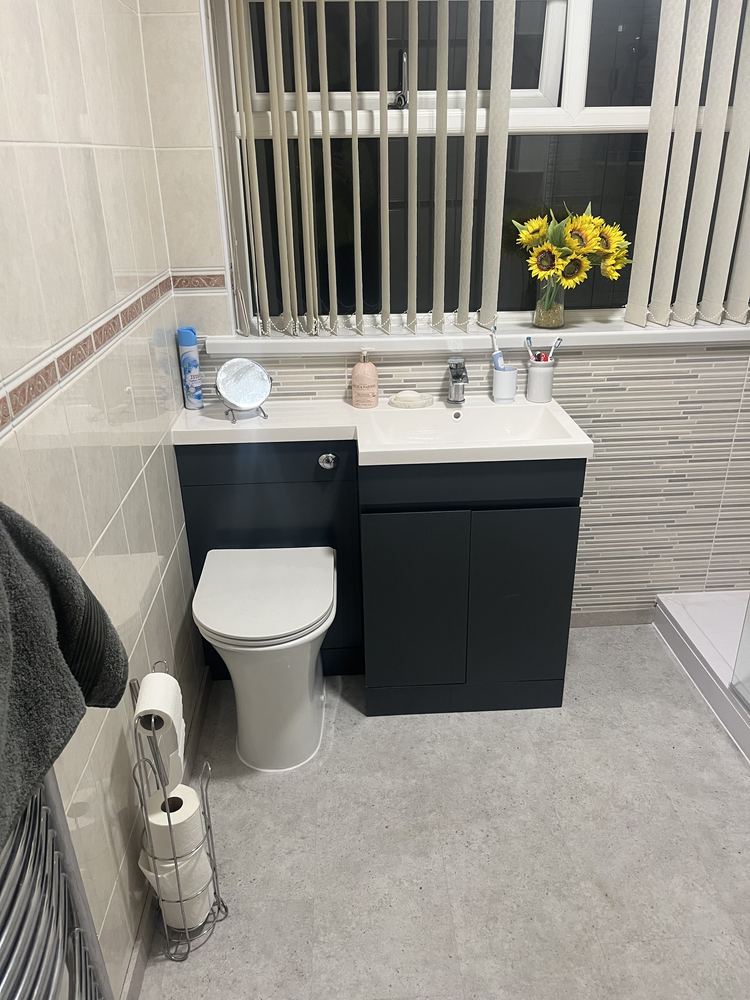 Anthracite vanity unit with basin and concealed-cistern toilet